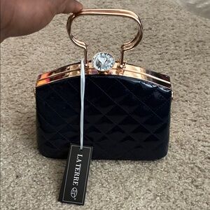 La Terre Navy Quilted Clutch with Gold Handle